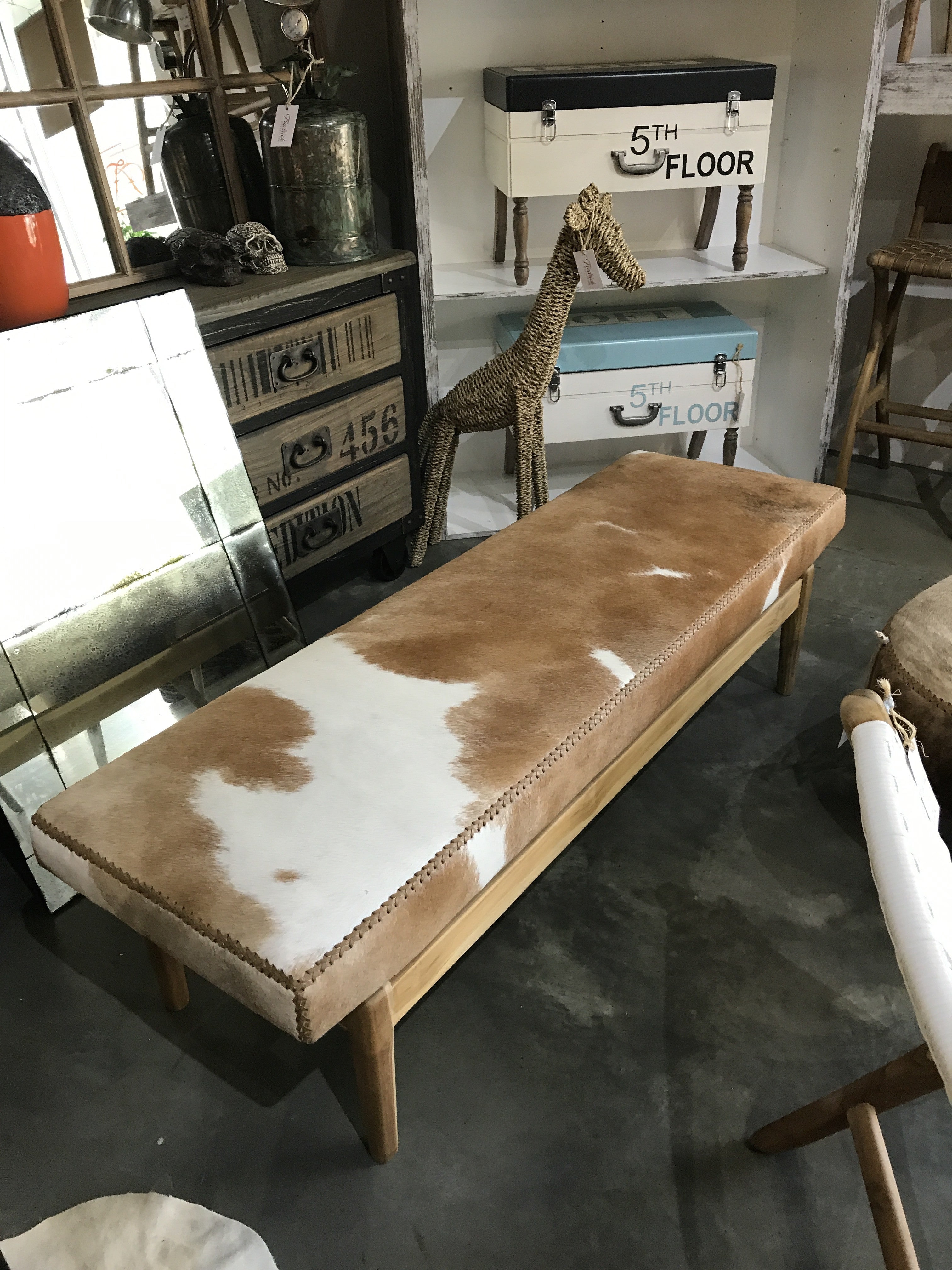 Tan and White Cow Hide Bench